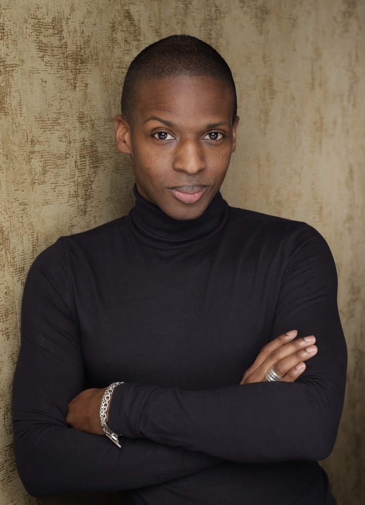 Roldon Brown working at a computer